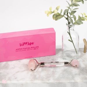 Duel sided Rose Quartz Face Roller new in box with instructions.